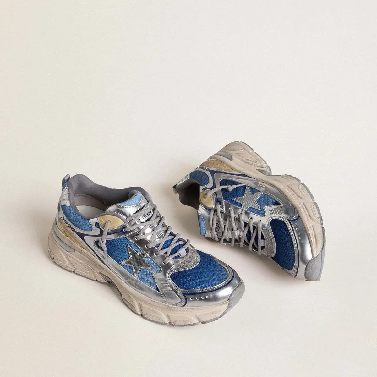 Golden Goose Lightstar In Light Blue Mesh With White Tpu Star And Silver Bio-Based Inserts Golden Goose Lightstar In Light Blue Mesh With White Tpu Star And Silver Bio-Based Inserts