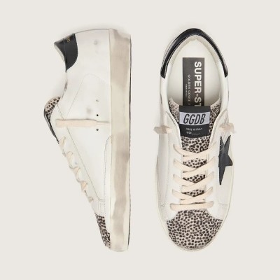 Golden Goose Super-Star Ltd In White Leather With Black Star And Pony Skin Details Golden Goose Super-Star Ltd In White Leather With Black Star And Pony Skin Details