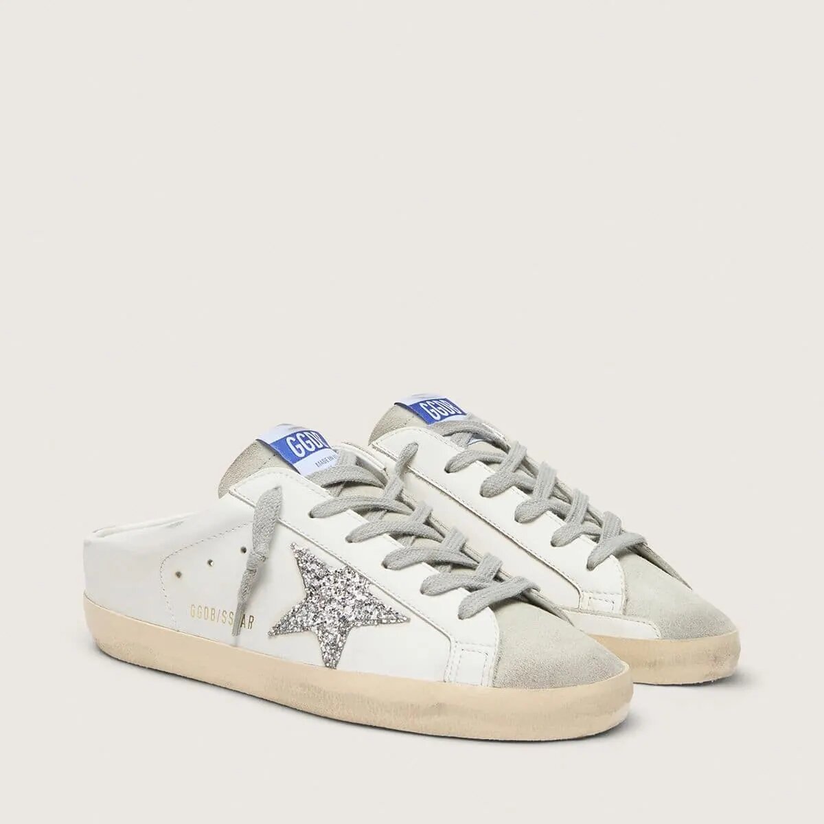 Golden Goose Super-Star Sabot With A Platinum Glitter Star And Suede Tongue Golden Goose Super-Star Sabot With A Platinum Glitter Star And Suede Tongue